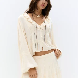Ruffled mini skirt with lace hem